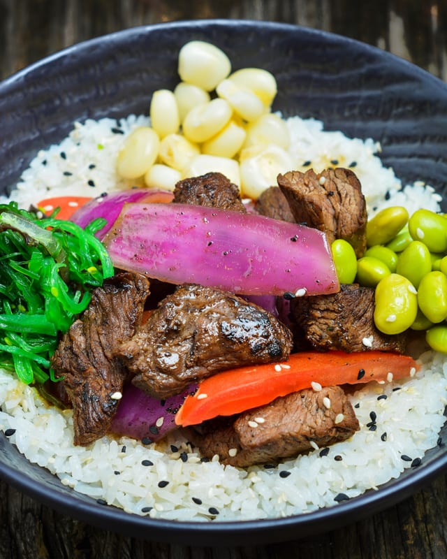 Poke Lomo Saltado with Our Spicy Mayo.